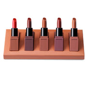 5 Vitamin Lipstick Set displayed on beauty product background