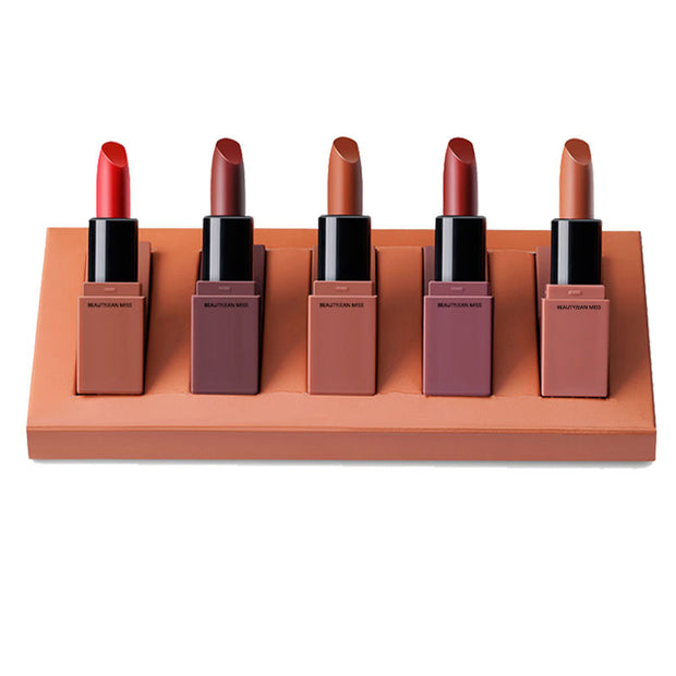 5 Vitamin Lipstick Set displayed on beauty product background