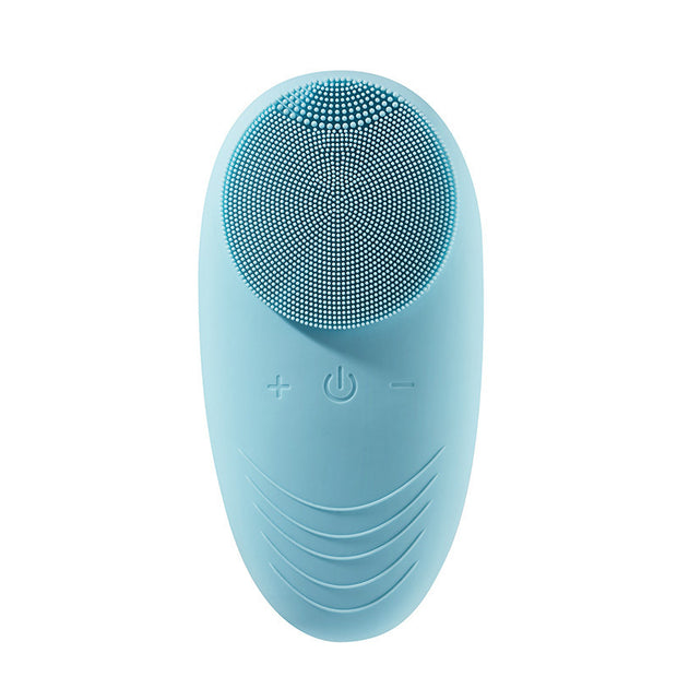 Electric facial brush displayed on clean skincare background

