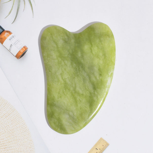 Jade gua sha tool for face lifting and massage therapy

