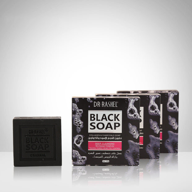 Black charcoal bamboo soap bar on spa background
