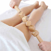 3 wooden massage tools displayed on spa background

