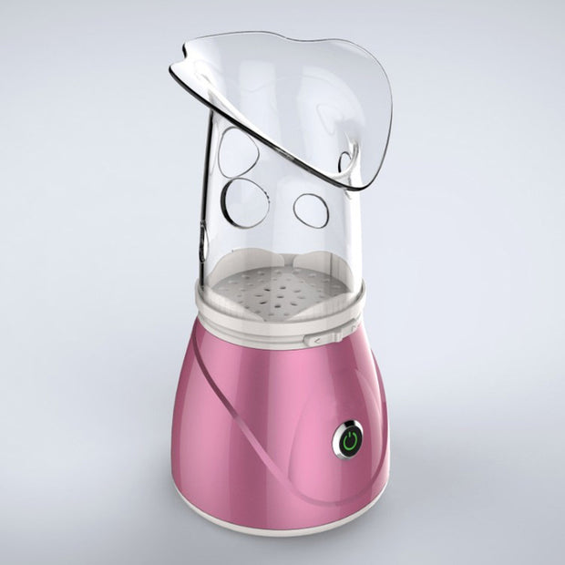 Home facial steamer releasing warm mist for skincare

