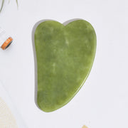 Facial massage board made of natural green jade stone

