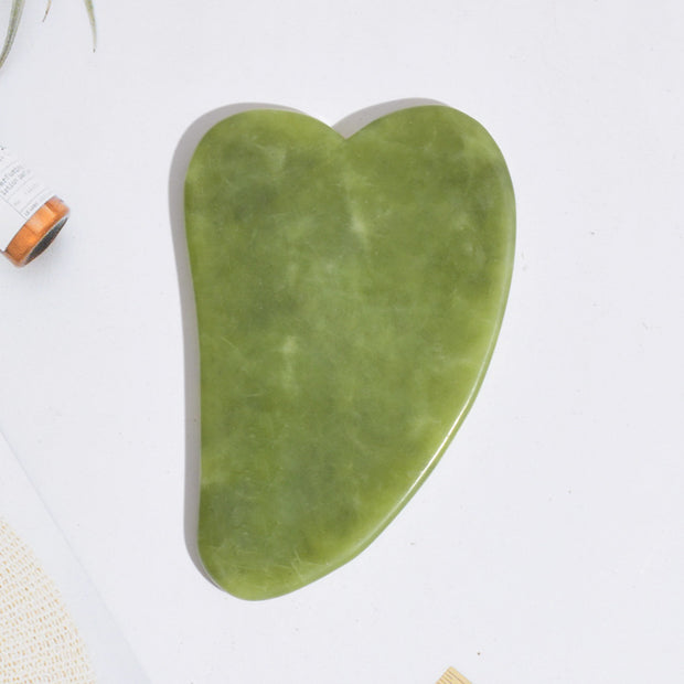 Facial massage board made of natural green jade stone

