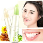 Plant-based honey lip balm displayed on beauty set

