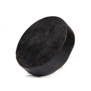 Bamboo charcoal soap bar on wooden spa background

